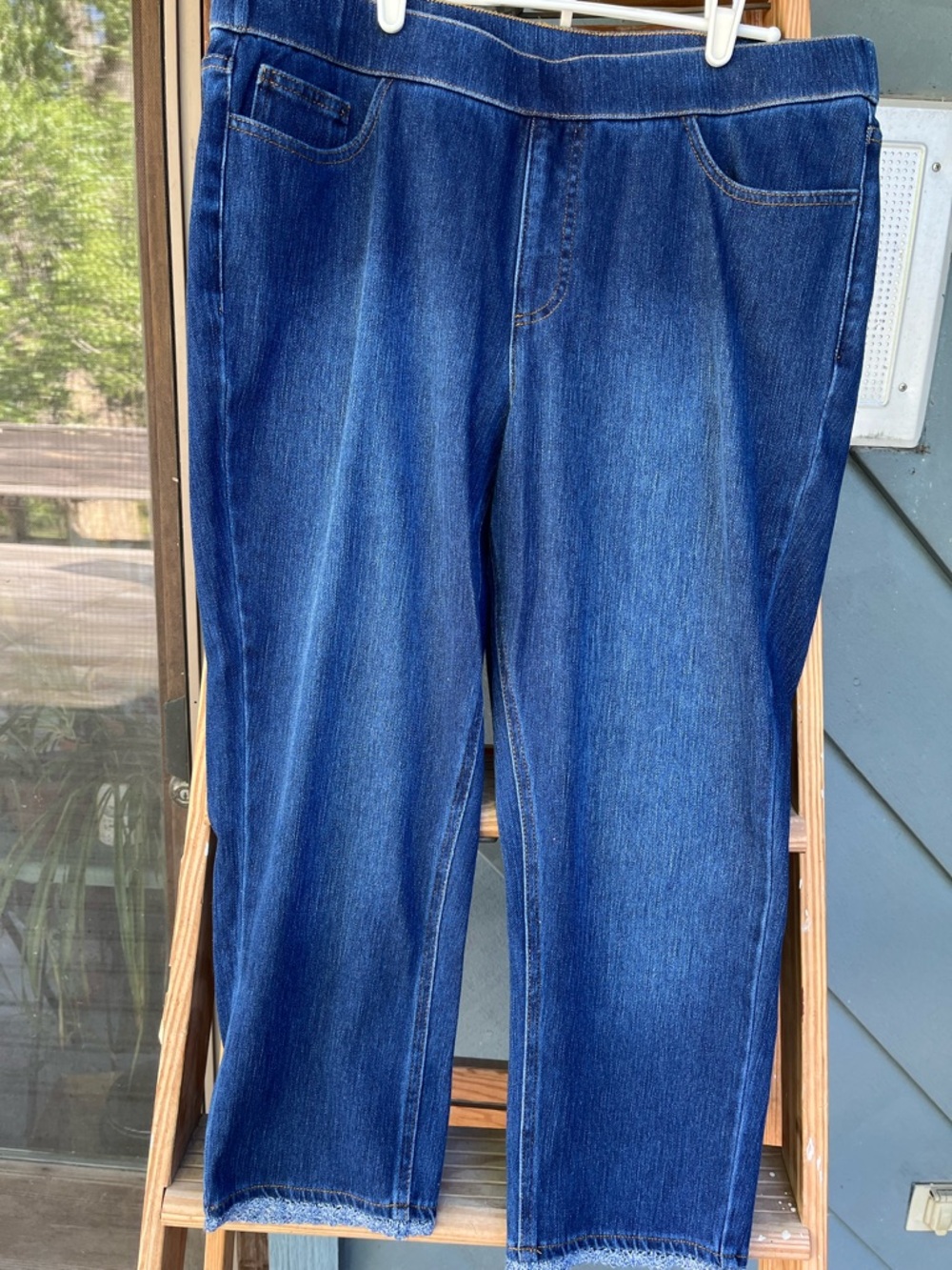 Denim capris with lace detail on hem